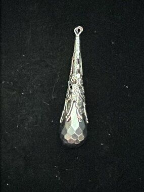 Dark Grey Faceted Teardrop in Elaborate Silver Tone Setting Pendant